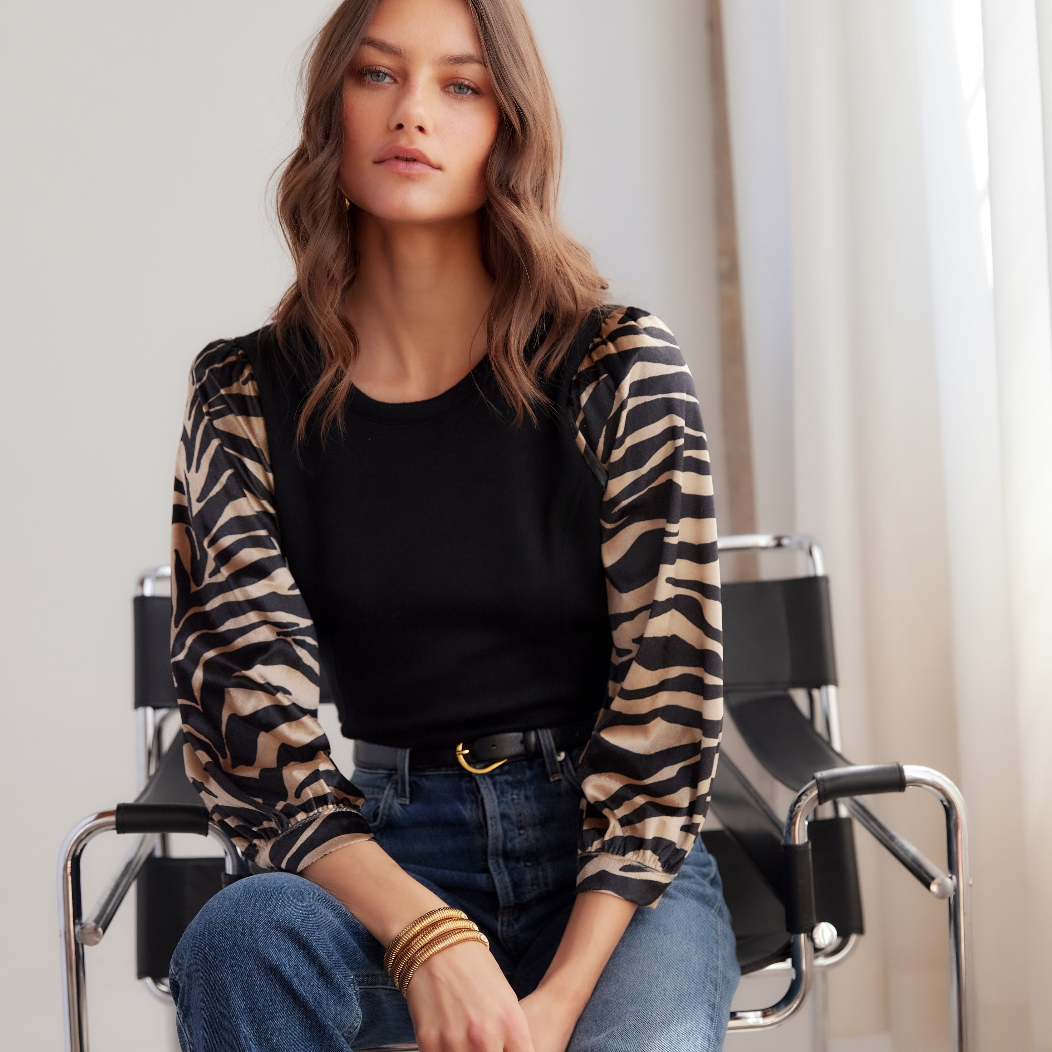 CONTRAST LORY TOP with black shirt base and long zebra print sleeves-sassanova