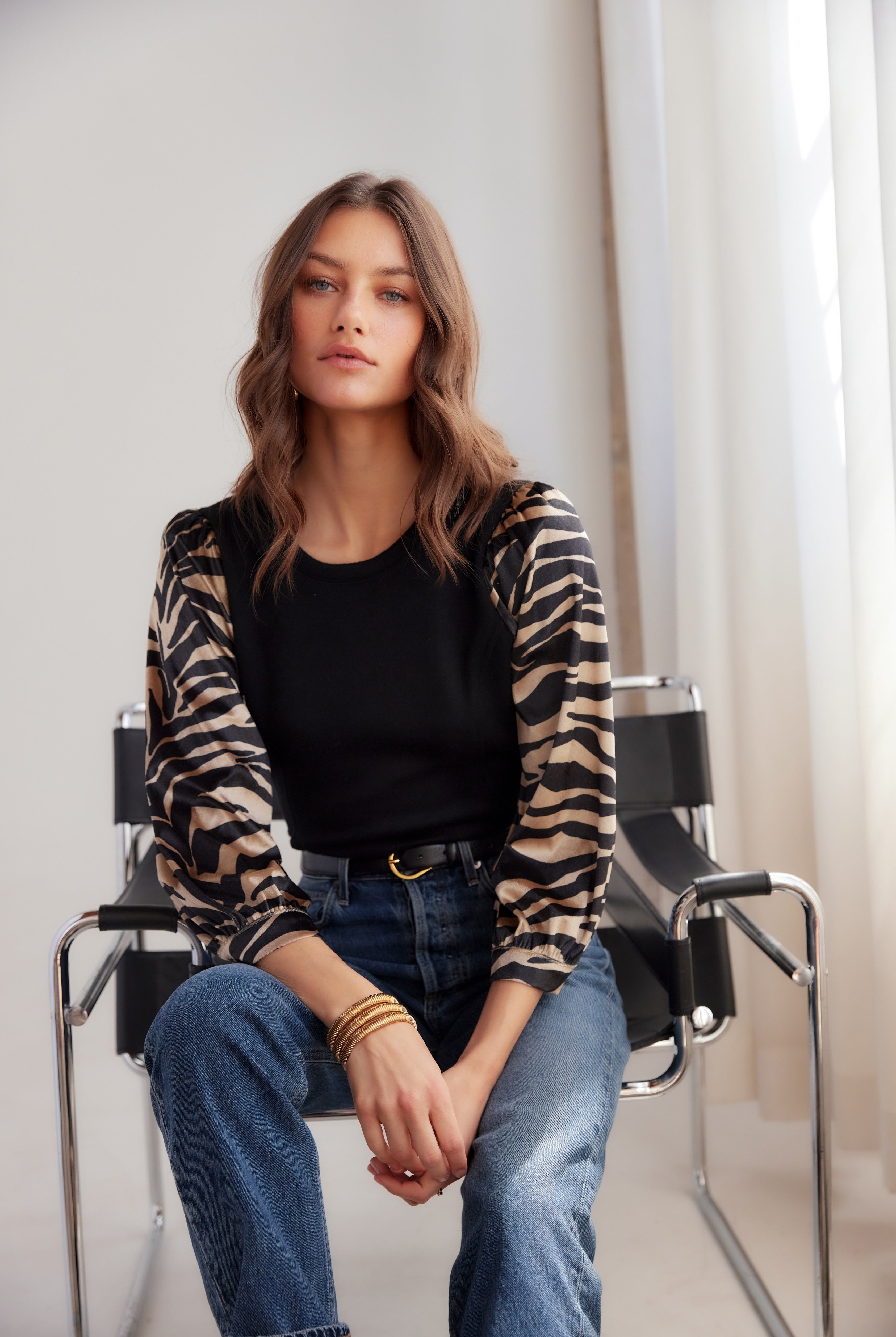 CONTRAST LORY TOP with black shirt base and long zebra print sleeves-sassanova