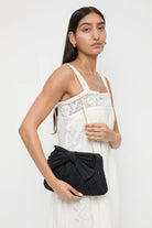 RAYNE BOW CLUTCH - Handbags - Sassanova