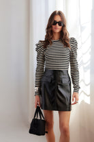Leia top with ribbed fabrication, horizontal black and white stripes, and long sleeves with puffed shoulders -  Sassanova