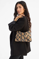 FLAT CLUTCH DESERT SNAKE - Handbags - Sassanova