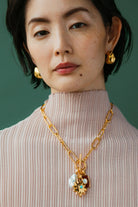 HELIOS CHARM NECKLACE in MERLOT - Necklaces - Sassanova