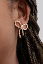 CRYSTAL BOW STUDS- GLD/CLEAR
sassanova