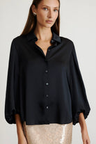 Marina top in solid silky black with button-down detailing-sassanova