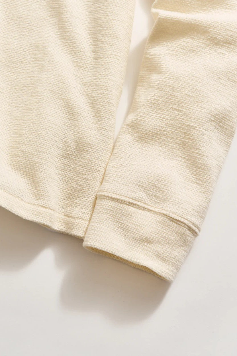 close up of long sleeved slub tuck henley in tinted white-novaman