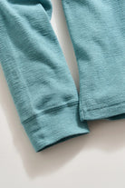 close up of long sleeved slub tuck henley in steel blue-novaman