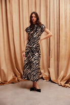 Evy long velvet skirt with zebra print and side slit detail - Sassanova