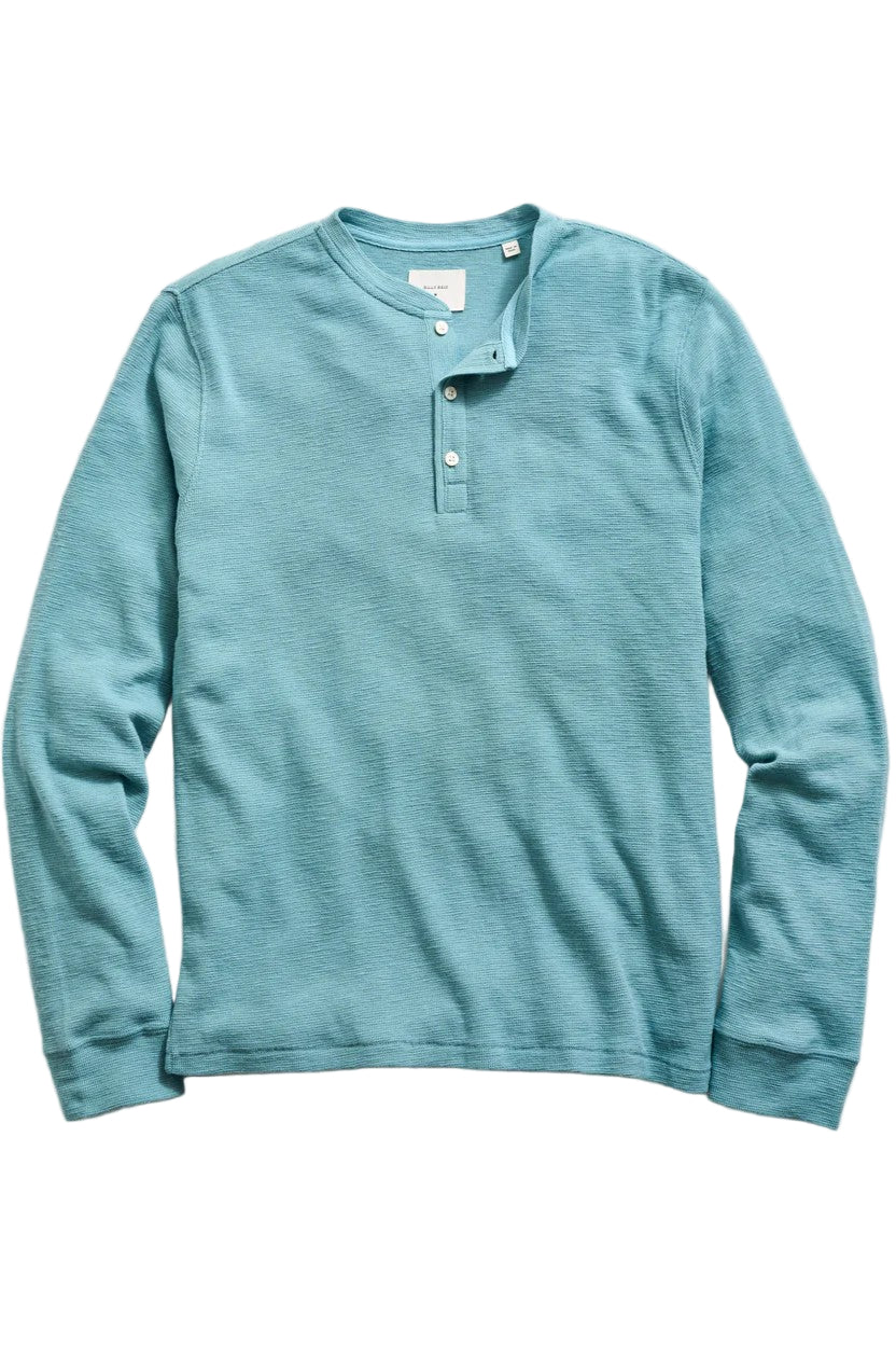 long sleeved flat lay of slub tuck henley in steel blue-novaman