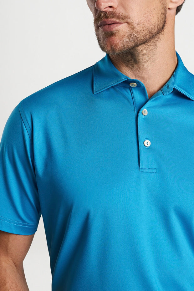 SOLID PERFORMANCE JERSEY POLO