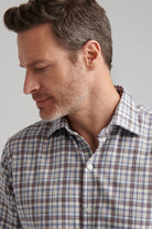 WAYNESVILLE PERFORMANCE FLANNEL SPORT SHIRT with long sleeves and a brown, blue, and beige plaid print-novaman